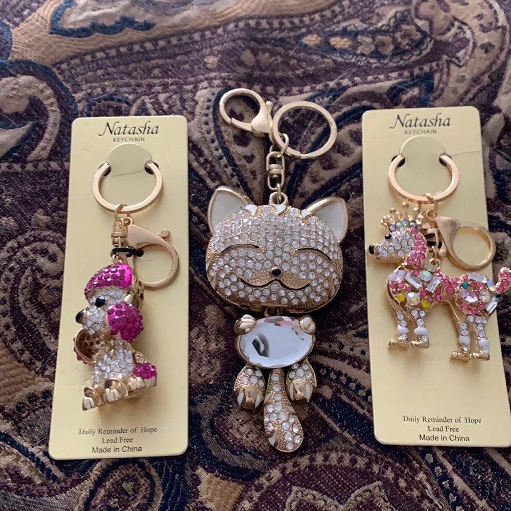 3 bling keychains. Great to attach to purse, keys or backpack.